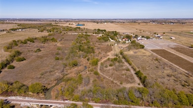 Aerial overview of property's location featuring rural landscape