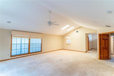 Dining living combination with lots of windows and