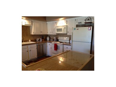 Beautiful Kitchen with gleaming tile counters and 