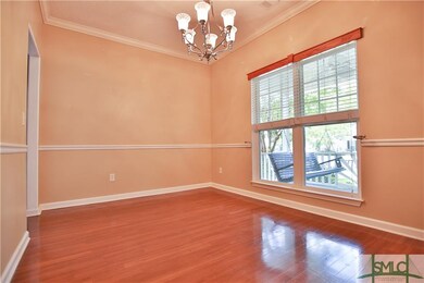 Separate Dining Room with beautiful wood floors, c