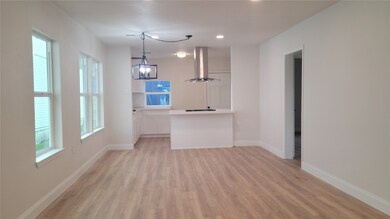 Step into a bright open-concept space that seamles