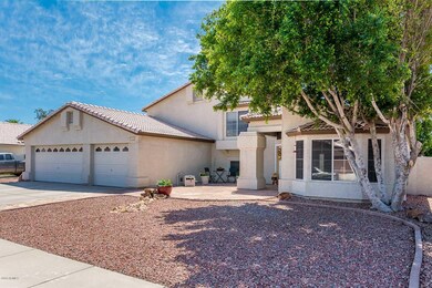 8811 W Wethersfield Rd - MLS-5