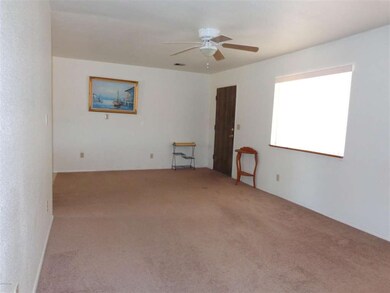 Large living room with fan