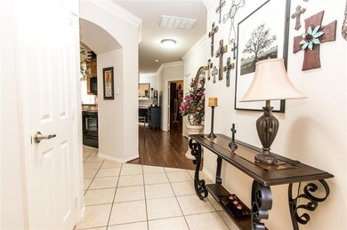 Beautiful tile flooring leading to wood floor tran