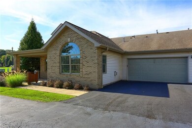 An oversized garage provides ample parking space f