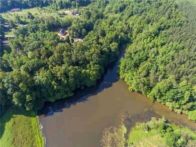 Arial view of pond that connects to back property.