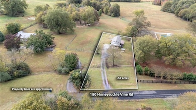 View of rural area with agricultural land and property parcel outlined
