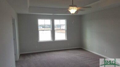 Master Bedroom with Tray Ceiling Fan and Light Kit