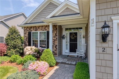 An expanded front porch features an architectural column and room for a chair, so you can relax and greet the neighbors.
