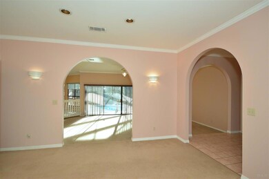 views into family room / pool; foyer to your right