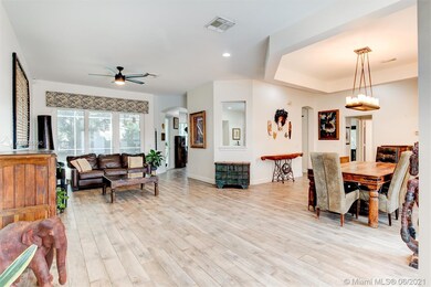 MAIN LIVING ROOM ADJACENT BY MAIN DINING ROOM AREA