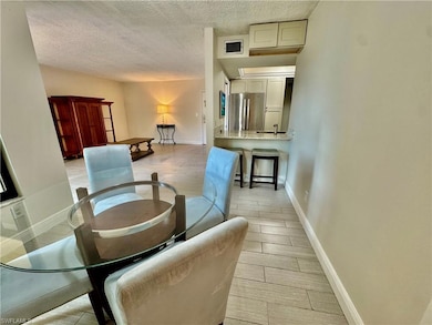Dining space featuring tile floors