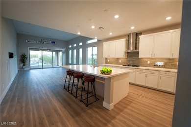 Kitchen with decorative backsplash, wood finished