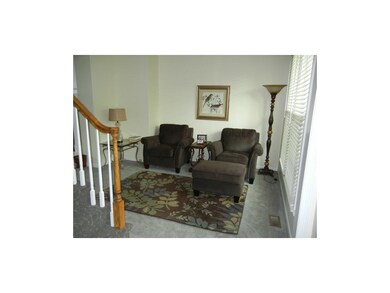 Formal living area or office.