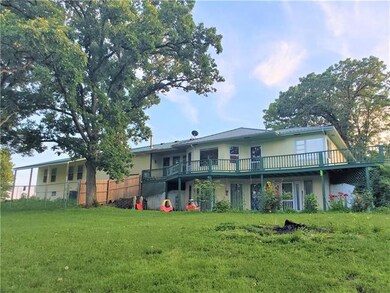 Summer picture of the back of the home.
