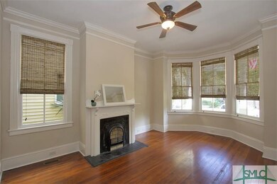Living room with original fireplace, decorative on