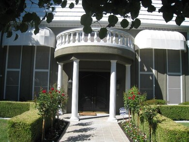 The entrance to this home is a stunning double sto