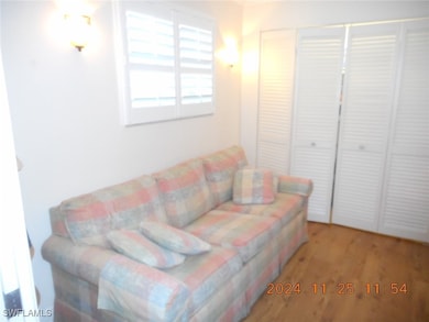 Living room with wood finished floors