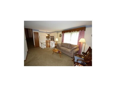 ENTRY FEATURES NEWER WING WINDOWS AND FLOORING