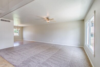 Spacious Living Room w/ Ceiling Fan
