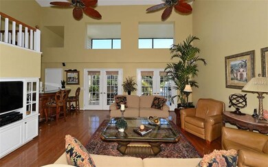 Living room with vaulted ceilings.
