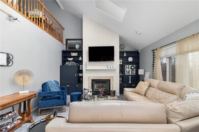 Living Room showing loft space above.
