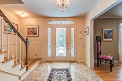 Elegant marble floor entry with plenty of room to 