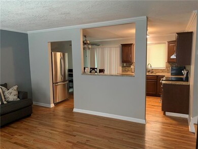 LIVING VIEW INTO KITCHEN