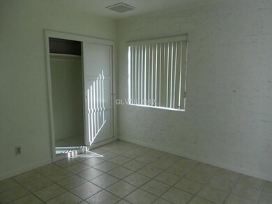 Master Bedroom. This tiled room also has access to