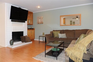 Cozy gas fireplace, custom built-in dry bar & ente