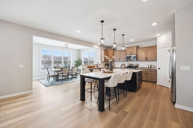 Bright and airy kitchen and dinning space perfect for meals and memories. Upgraded extended island for all your entertaining needs!