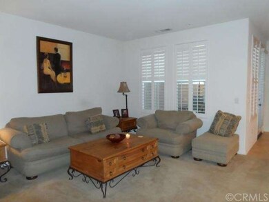 living room with plantation shutters
