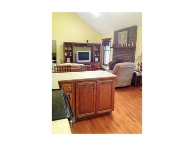 View from kitchen into family room, featuring, vau