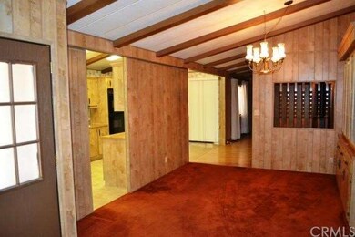 The kitchen area is just around the corner from th