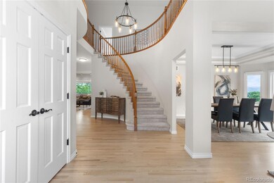 Grand winding staircase is just waiting for that p