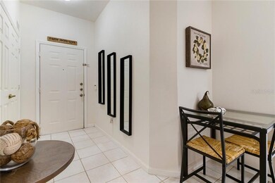 Entrance foyer / laundry room on left side in this picture