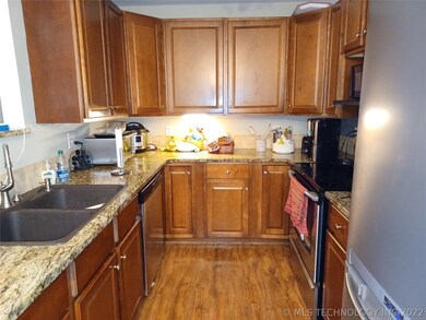 Nice cabinetry, granite sink and counter tops.
