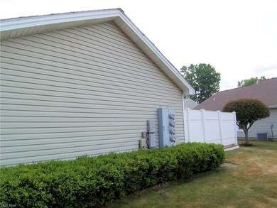 Side of condo showing private deck