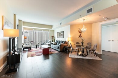 Living area featuring dark wood-type flooring, a c