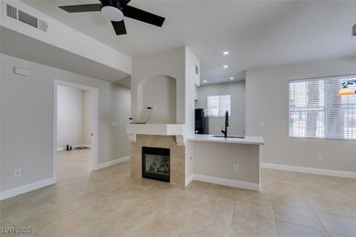 Unfurnished living room with a ceiling fan, light