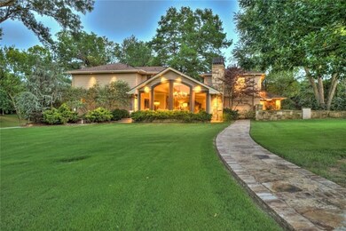 Custom sidewalks and drives on the property make moving around easy with a golf cart or perfect for you private walking trail.