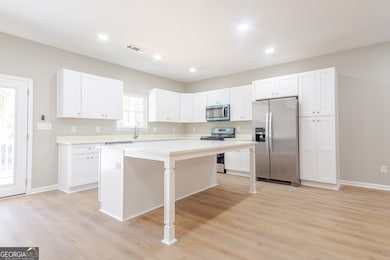 3078 Caliente Ln, Rex, GA 30273 - photo 4