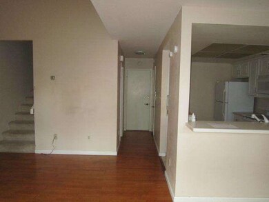 Hallway to half bath and garage