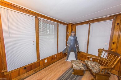 UNIT #1 SUNROOM / LARGE FOYER