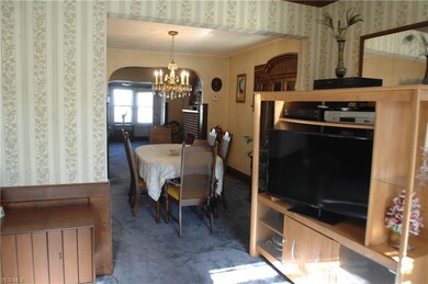 The view looking towards the formal dining room. Holidays here were full of family, friends, and laughter.