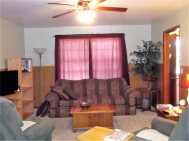Living area. Could be dining room or 2nd living ar