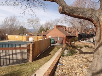 View of yard with a fenced front yard, a gate, and