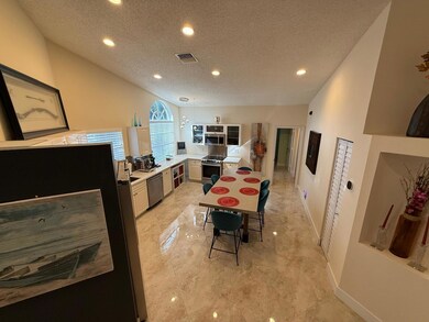 5180 Sabal Gardens Ln unit 4, Boca Raton, FL 33487 - photo 7