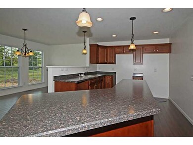 Kitchen. Alternate View of Kitchen.  Photos repres