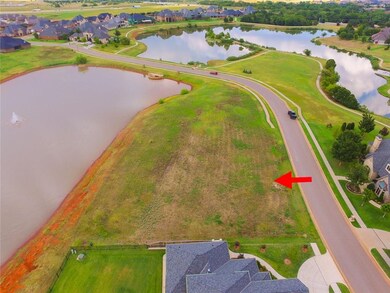 Prime waterfront lot in sought-after gated communi